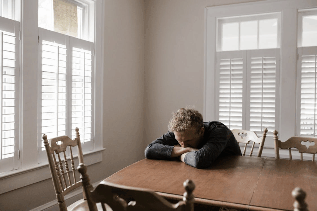 man sitting at table