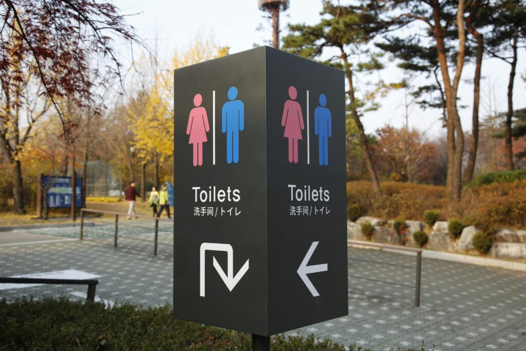 Toilet Sign in a Park
