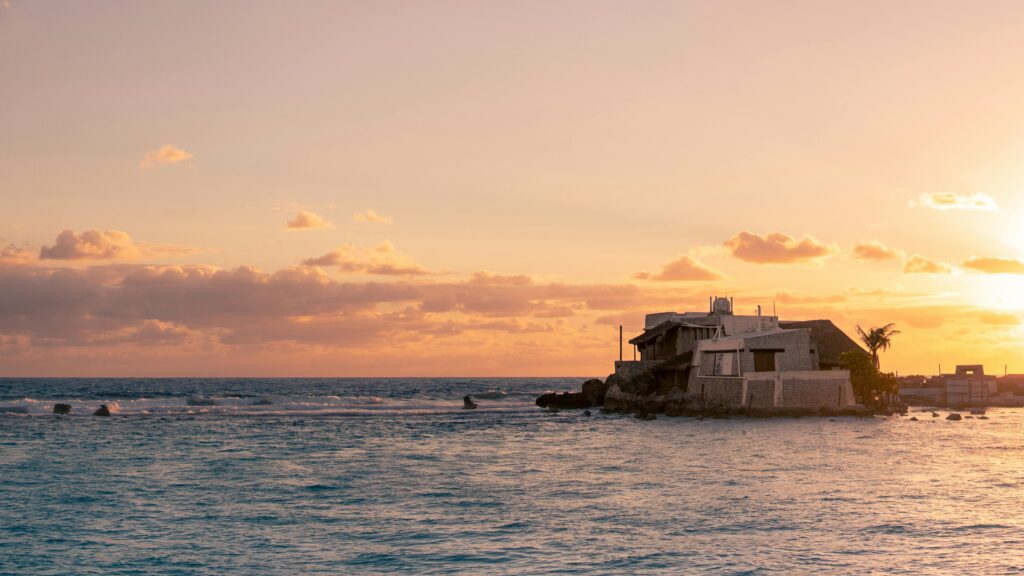 House in Isla Mujeres Bay Mexico at Sunset

