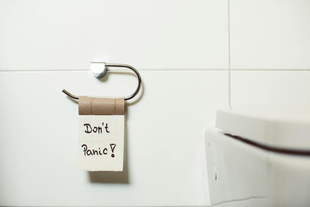 Don't Panic Text on Toilet Paper
