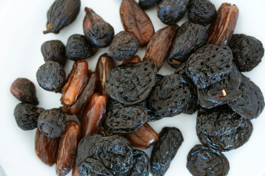 Brown and Black Round Fruits
