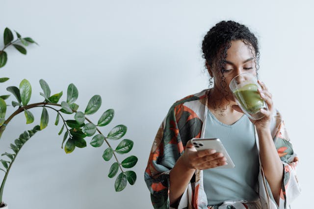 woman drinking a matcha