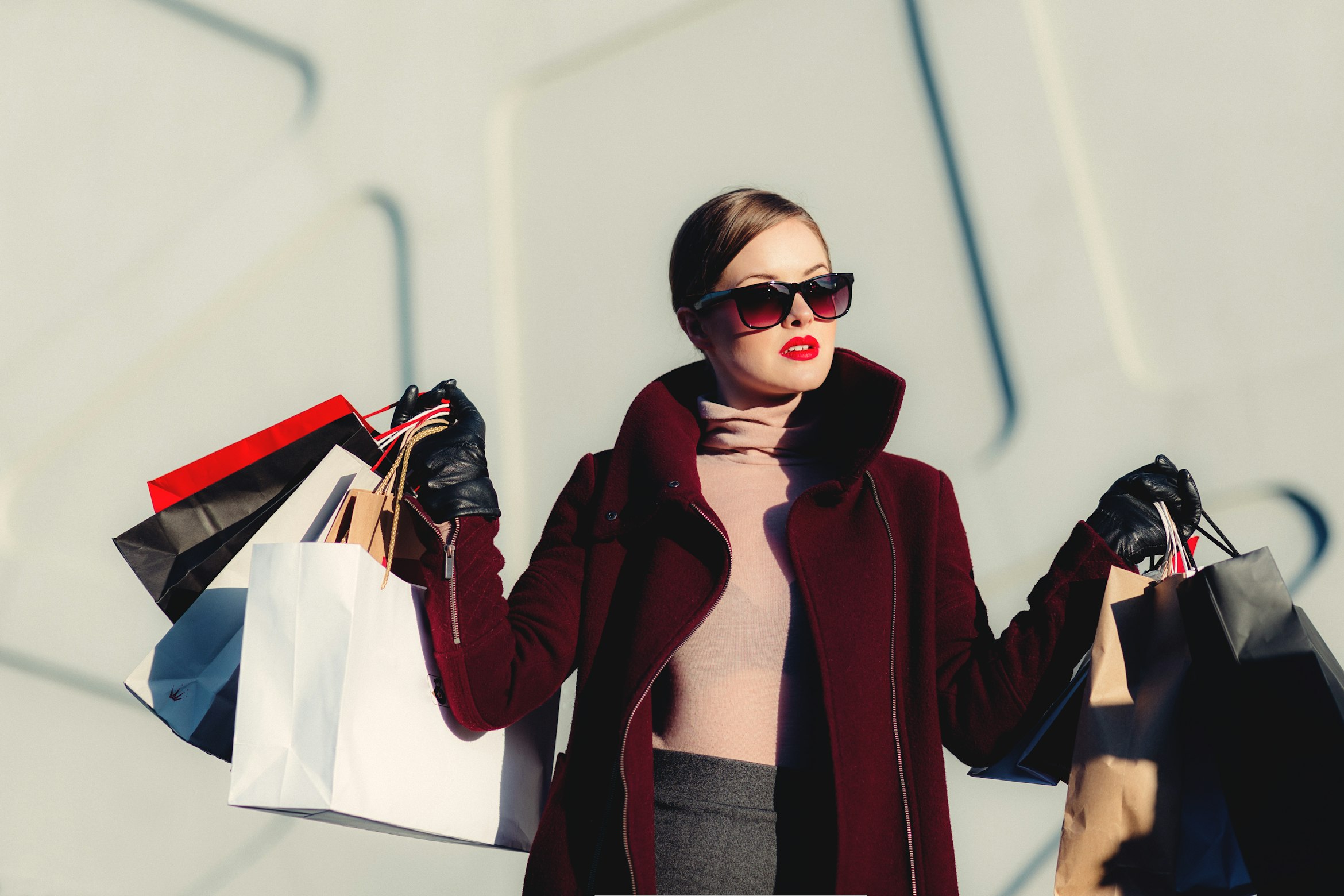 woman with many shopping bags
