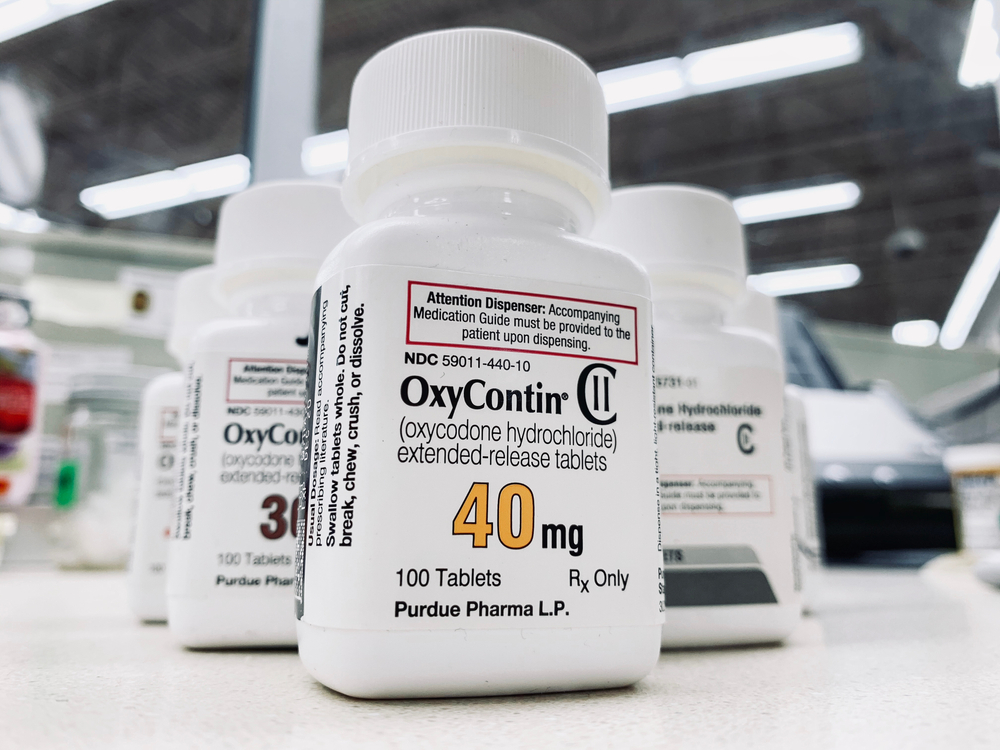 Ogden Utah USA: October 27,2020- OxyContin bottle on counter. Purdue pharma manufacturer has been in a legal battle on their influence in the opioid epidemic.