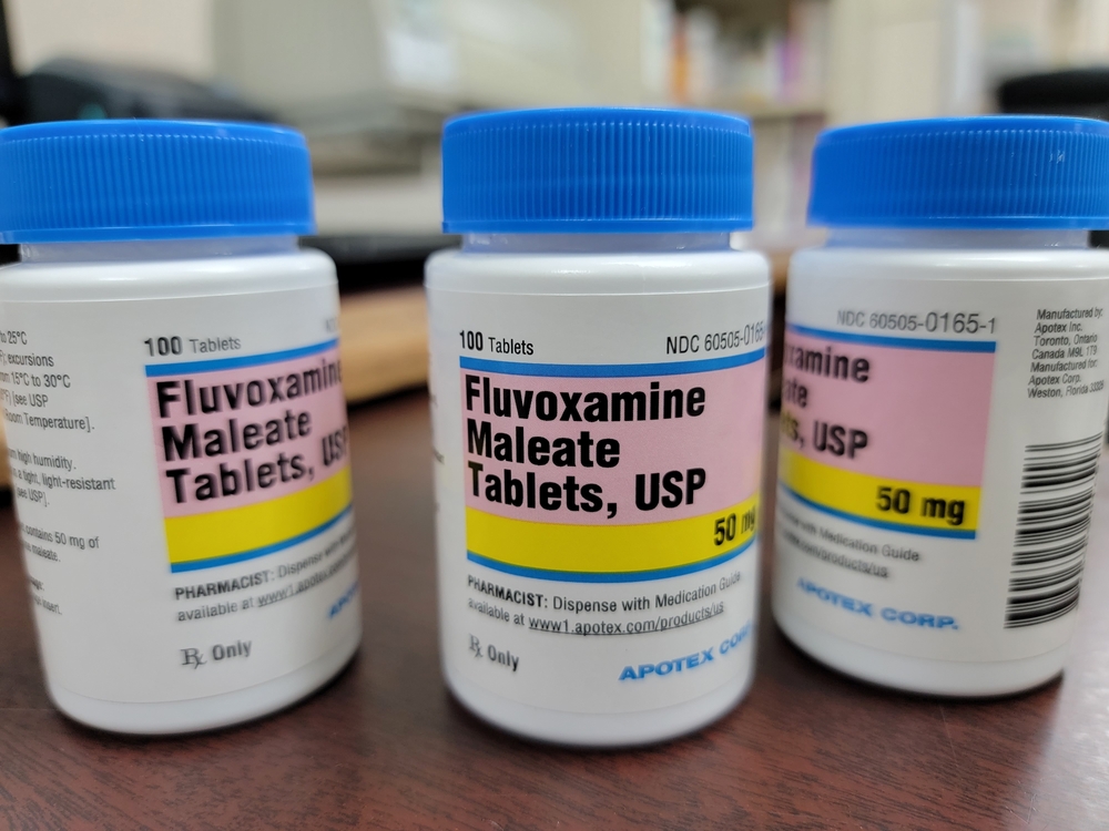Cypress, United States - Jan 13, 2022: Bottles of Fluvoxamine Maleate pills on the table