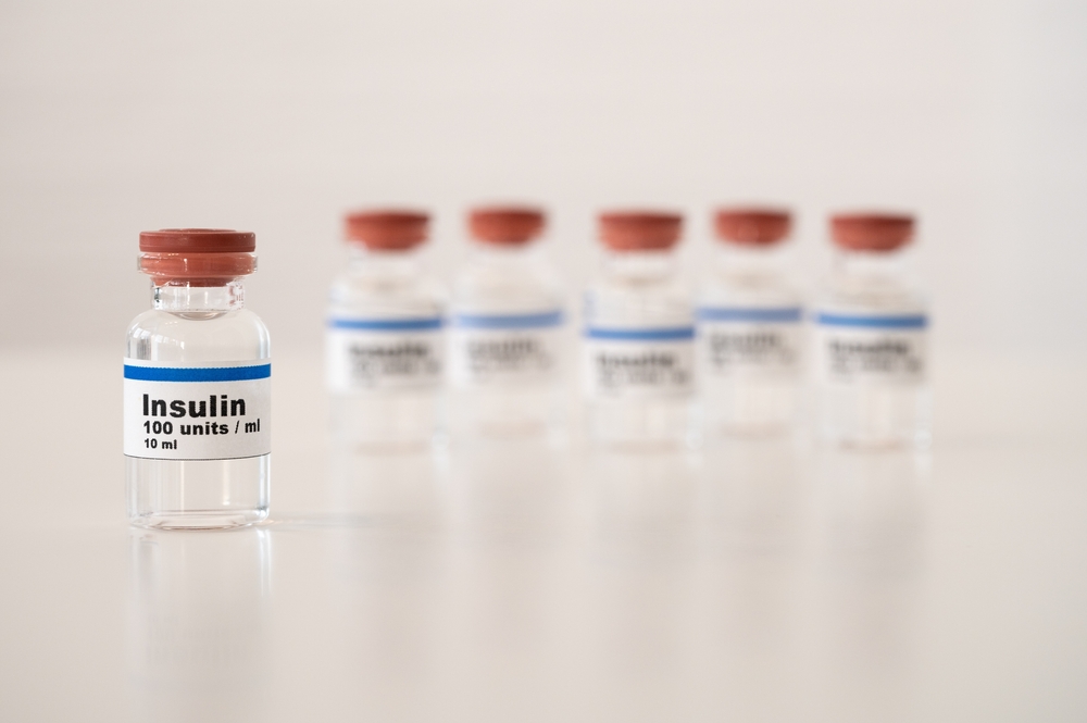 Insulin vials against the white background: efficient cooling and storage of insulin.