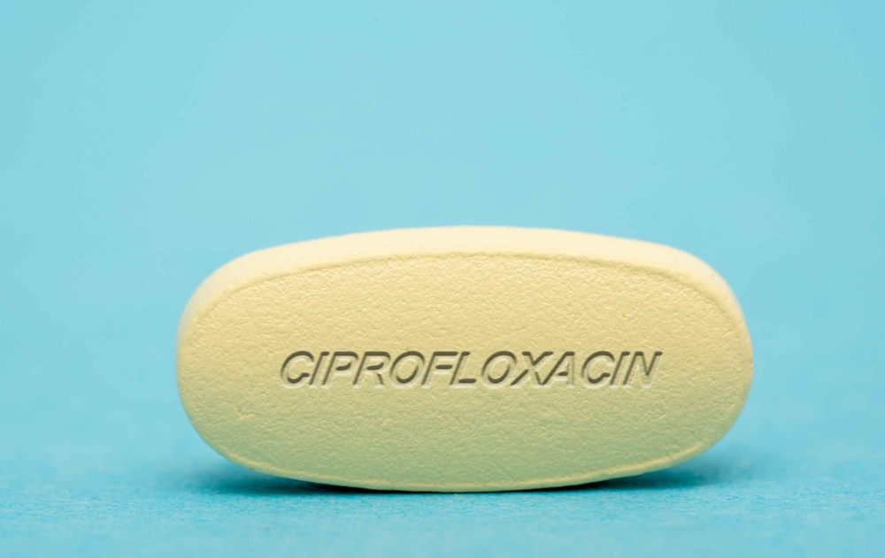 Ciprofloxacin Confuse Computer Tablet Computer Pill . Medical concepts.