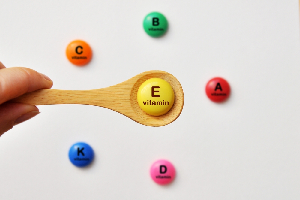 Vitamin E on a spoon. Foods high in vitamin E