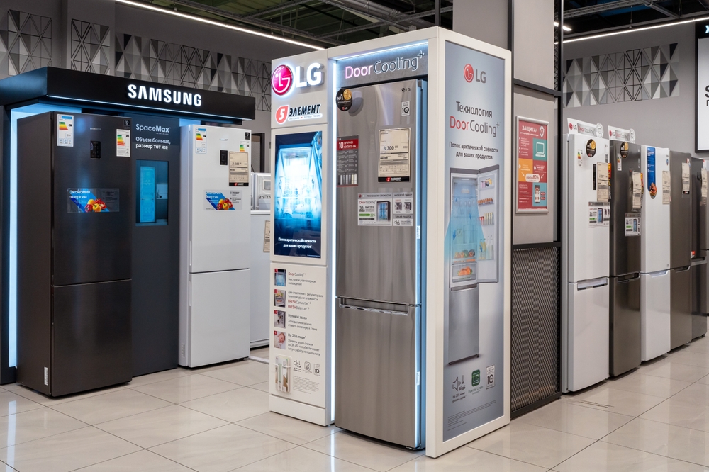Large selection of Refrigerators in the store. Refrigerators of LG and Samsung brands in an electronics store. Minsk, Belarus - november 13, 2023