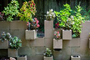 16 Stylish and Practical Cinder Block Ideas for Home and Yard Cement,Cinder,Blocks,Make,A,Unique,Stair,Step,Plant,Display.