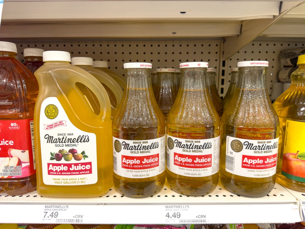 Los Angeles, California, United States - 01-01-2025: A view of several large bottles of Martinelli's apple juice, at the store.