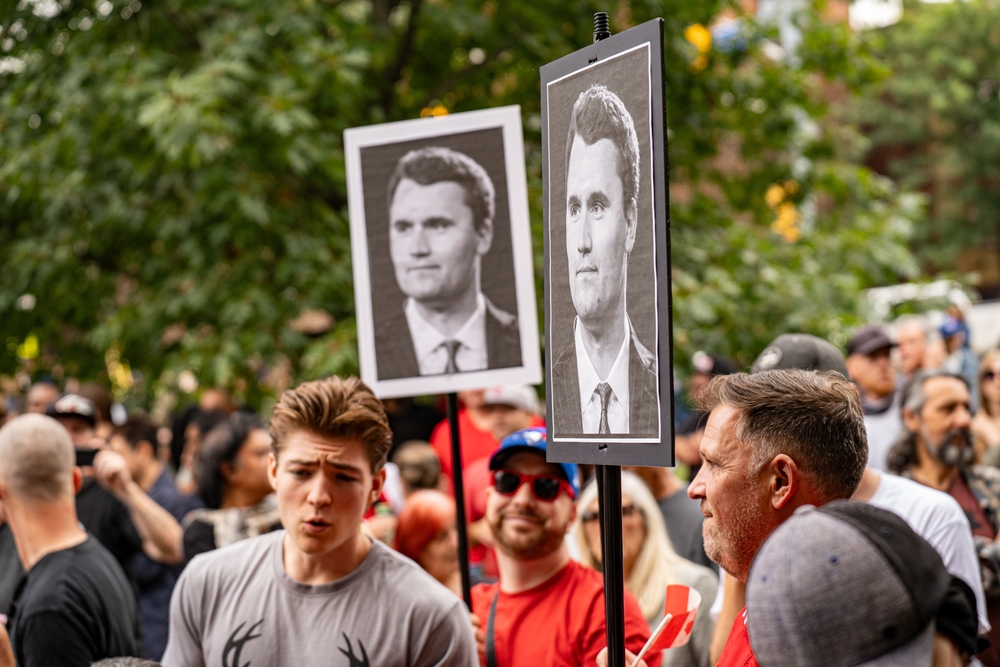 View of Charlie Kirk posters at anti-immigrant rally. Toronto, Canada - September 13, 2025.