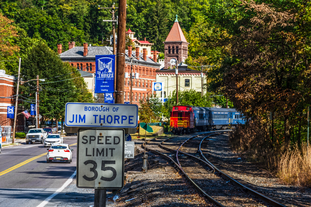 JIM THORPE, PENNSYLVANIA, - SEPTEMBER 28: Railroad tracks along Route 209 lead into Scenic Jim Thorpe on September 28 2016 in Pennsylvania.