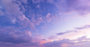 Climate Researchers Issue Warning After Disturbing Phenomena Discovered in US and Canada a sunset or sunrise with pink and purple clouds. The colors seen during a sunrise or sunset are a result of how light from the sun is scattered by the Earth's atmosphere