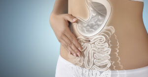 Powerful Visualization Reveals How Cancer Leads to Death Over Time Woman with healthy digestive system on light blue background, closeup. Illustration of gastrointestinal tract