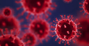 close up illustration of red viral particles