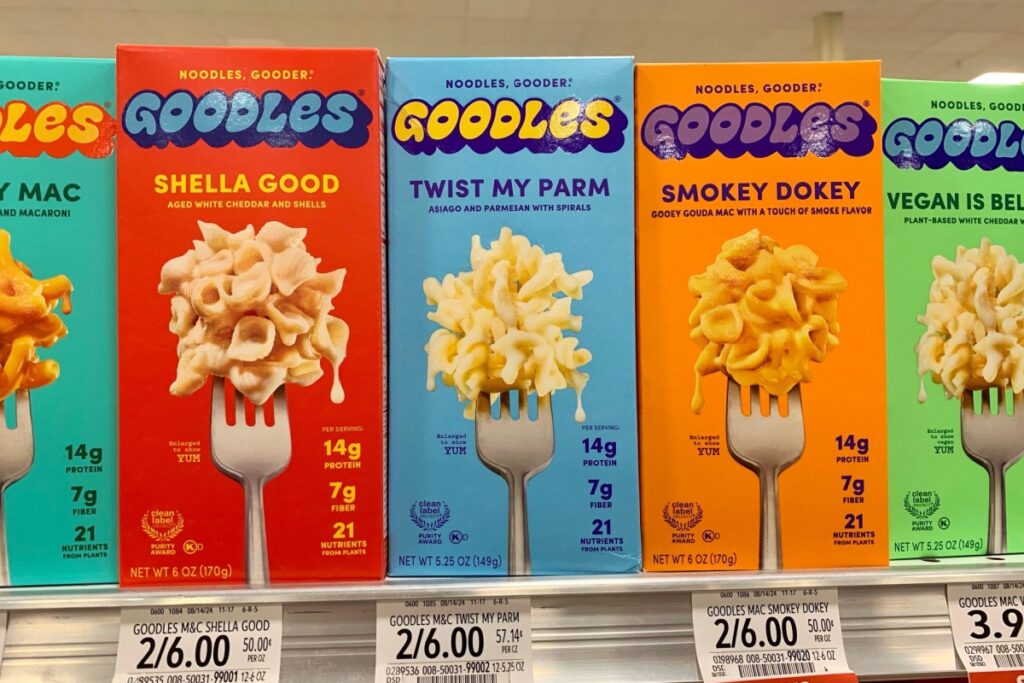 Boca Raton, FL USA - September 7, 2024: A close-up of noodles gooder goodles with a variety of flavors on a shelf with prices in Publix