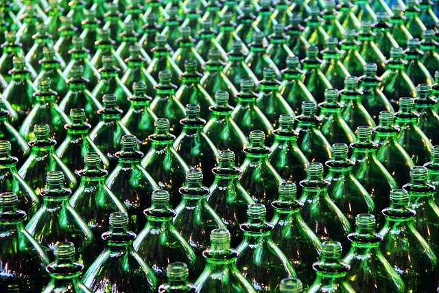 Hundreds of green glass bottles