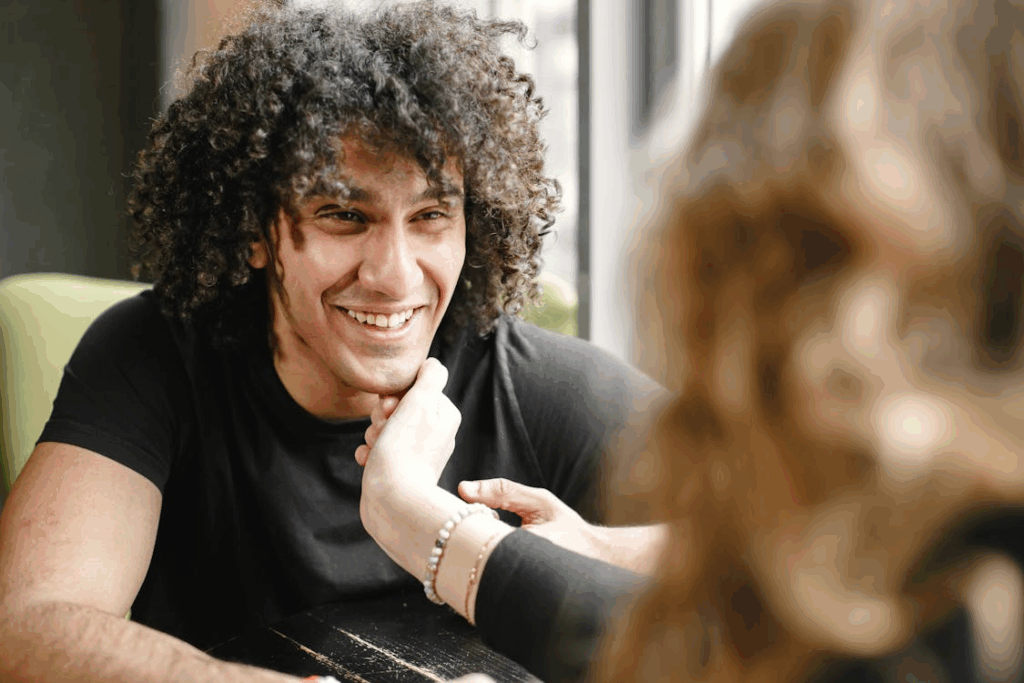 A Woman Touching Her Partner's Chin