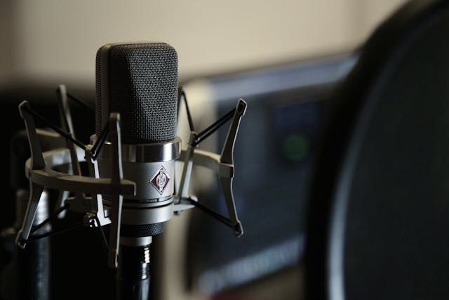 a microphone in a sound studio