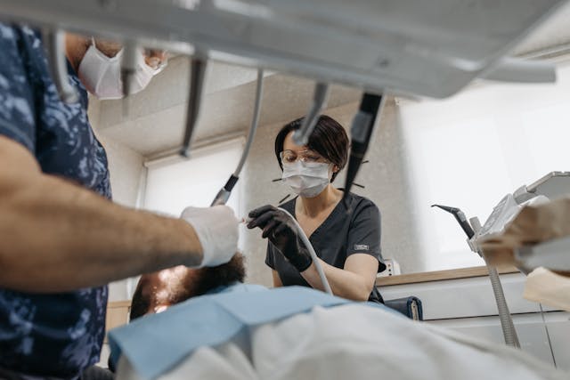 a man sitting in a dentist's chair