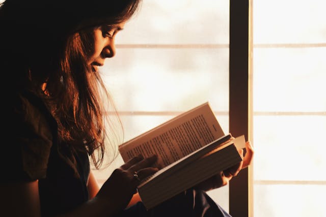 a woman reading a book