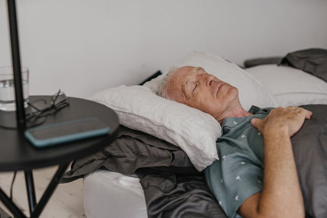 man lying in bed