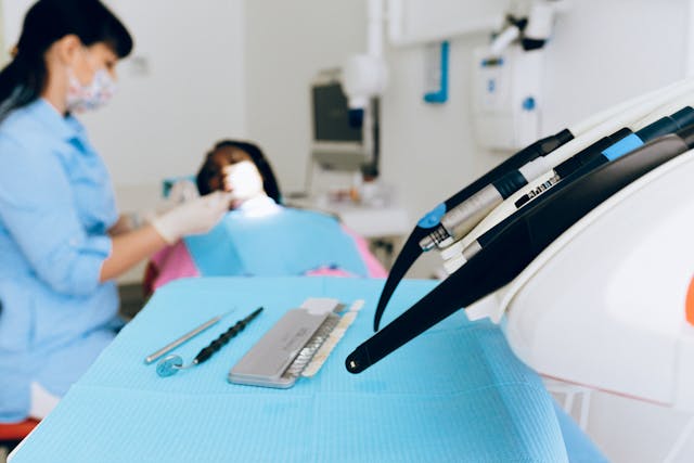 a dentist working on a patient