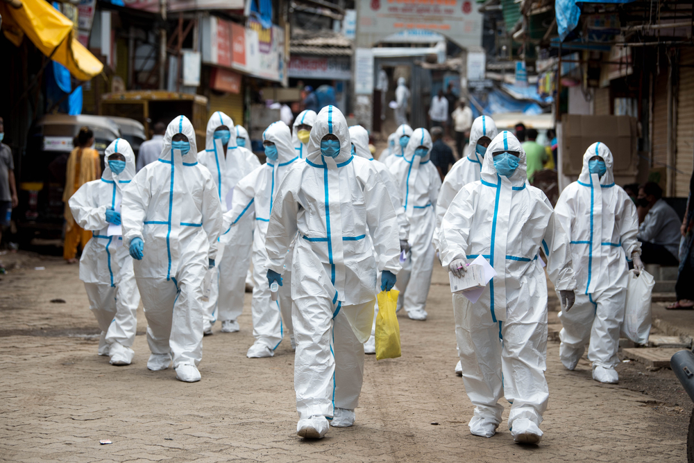 Mumbai / India- June 25, 2020: Health workers wearing protective equipment arrive to participate in a crisis camp in Balad during the coronavirus 19.