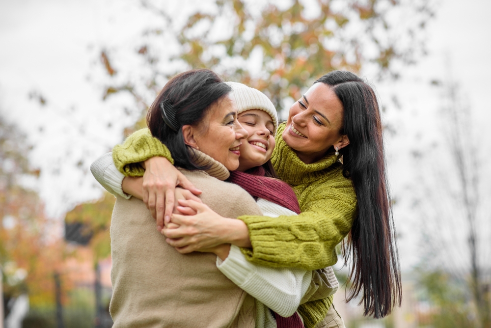 A mature daughter, my grandparents said goodbye. Mother's Day and Multigenerational family concept.