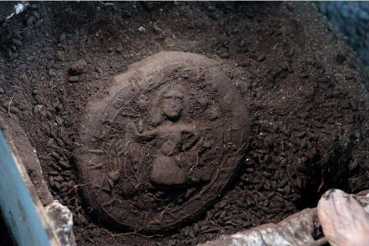 the image of Jesus on loaf of bread