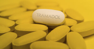 yellow colored Tramadol tablets, close up