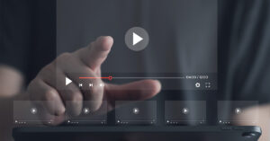 The Science Behind Why We Replay the Same Songs — and the 4 Big Reasons It Feels So Good person interacting with a virtual screen or a tablet to stream online content