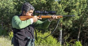Authorities Investigate Alleged ‘Human Safari’ Hunts by Rich Tourists man pointing rifle