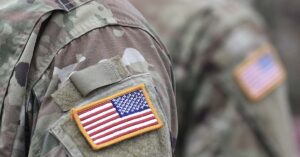 28-Year-Old Army Veteran Dies After Completing Half-Marathon; Had Planned Secret Wedding with Girlfriend American flag patch on the shoulder of an United States Army military member