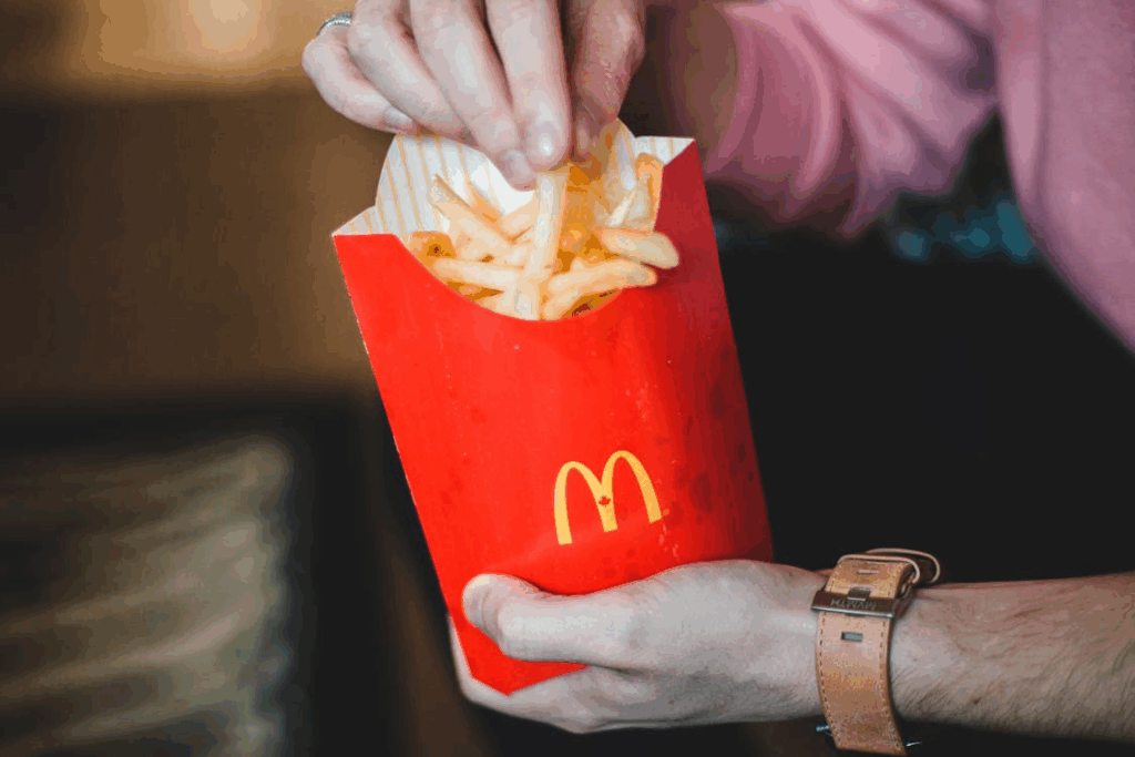 Photo Of Person Holding McDonald’s  Fries