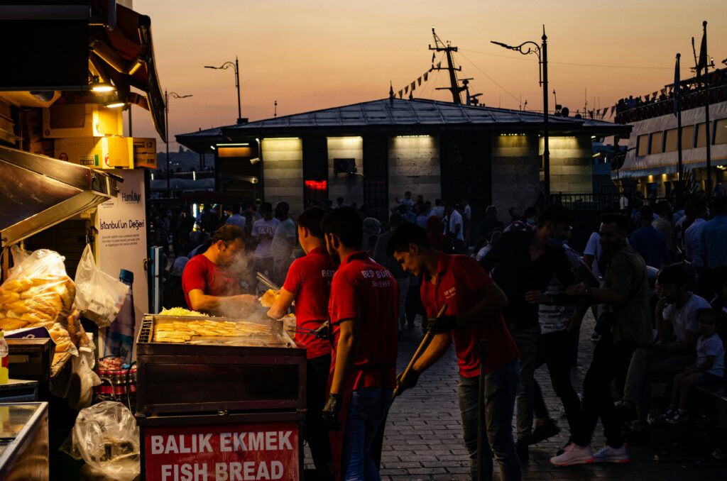 People and Vendors on a Street
