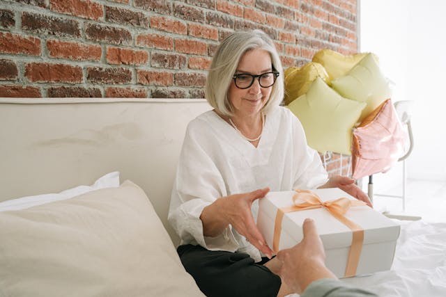 elderly woman on couch