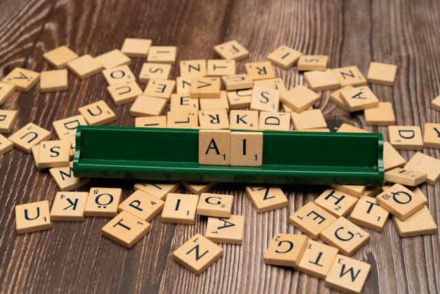 scrabble letters spelling AI