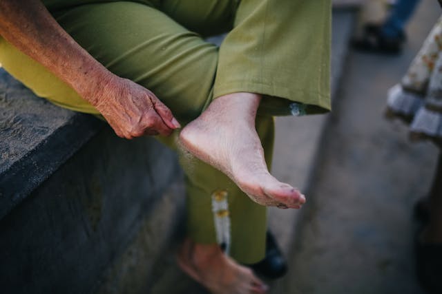 person checking feet