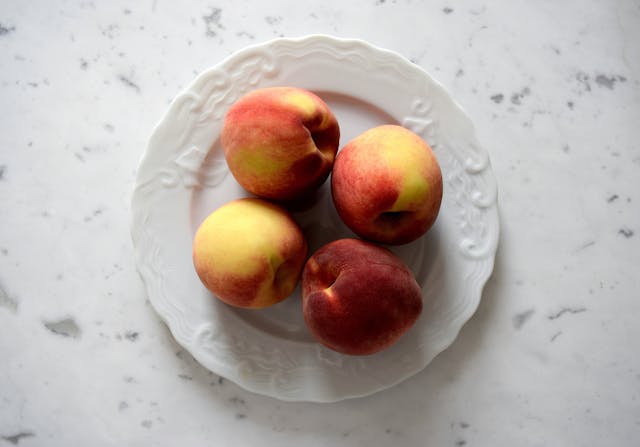 red apples on a plate