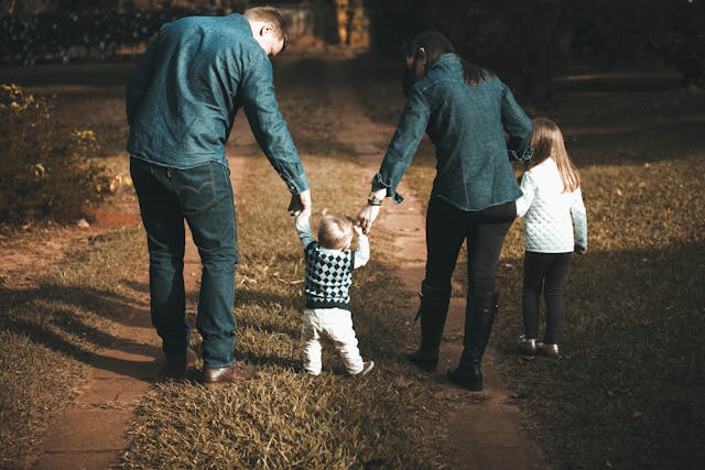 family walking in park