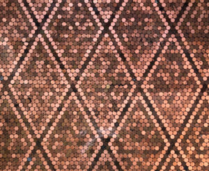 Now That Minting Has Ended, What Should You Do with Your Pennies - Before You Regret It various pennies creating a diamond pattern
