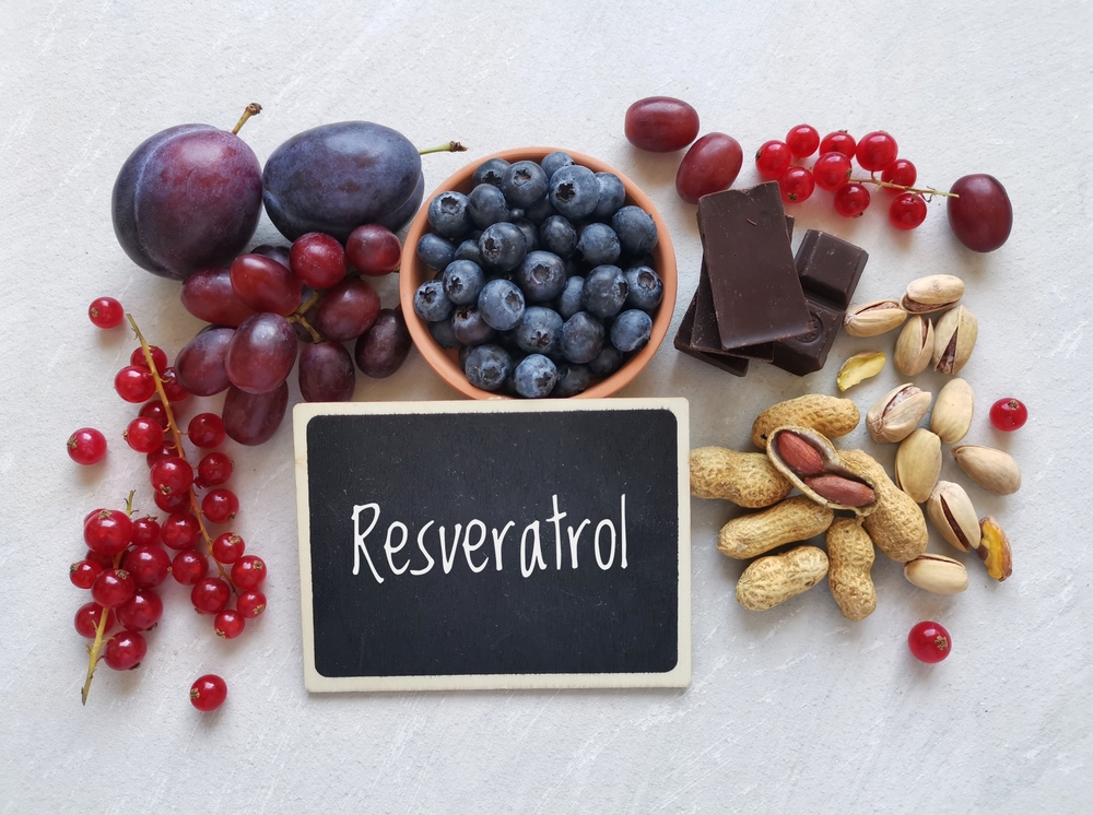 Foods rich in resveratrol. Resveratrol is a powerful antioxidant. Grape, plum, blueberry, red currant, dark chocolate, pistachios, peanuts as natural sources of resveratrol. Healthy diet concept.