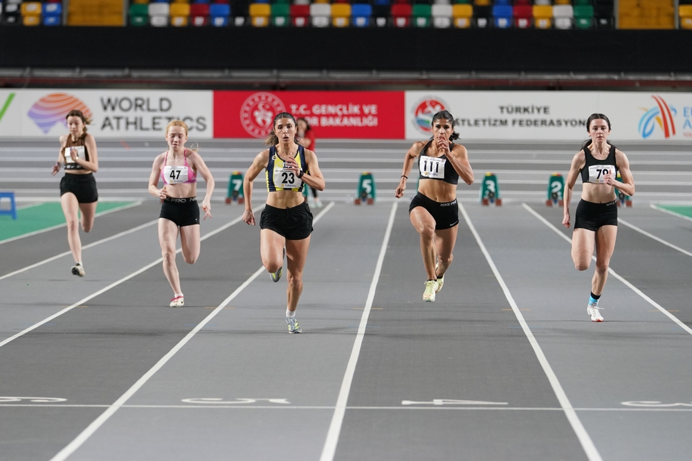 ISTANBUL, TURKIYE - JANUARY 20, 2024: Athletes running 60 metres during Turkish Athletic Federation Olympic Threshold Competitions in Atakoy Athletics Arena