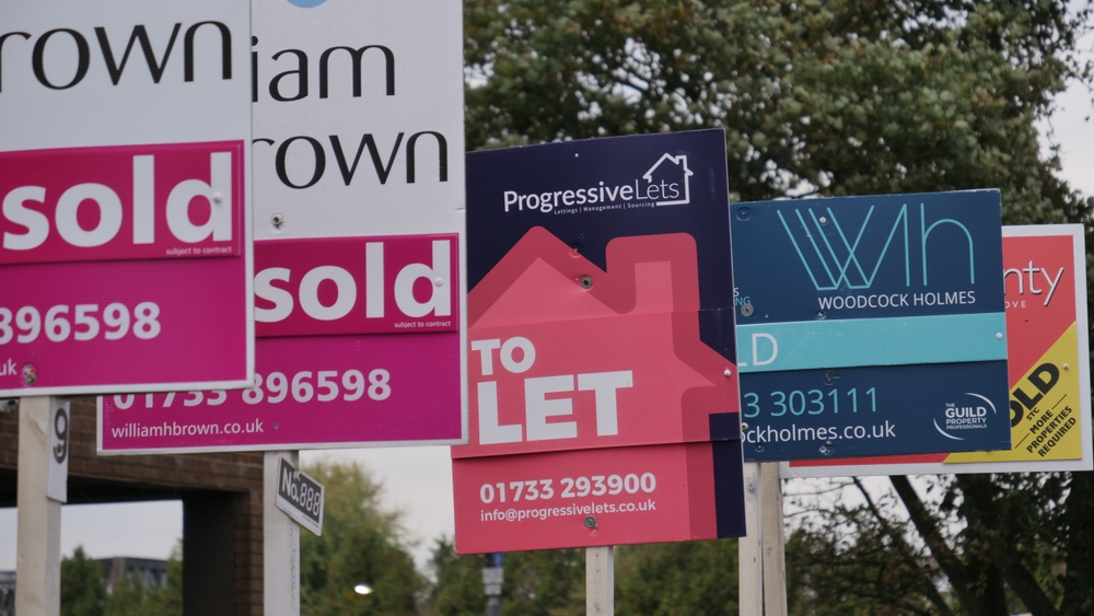 Peterborough, Uk, Oct 6, 2024. Residential property for sale with estate agent signs outside the home for sale.