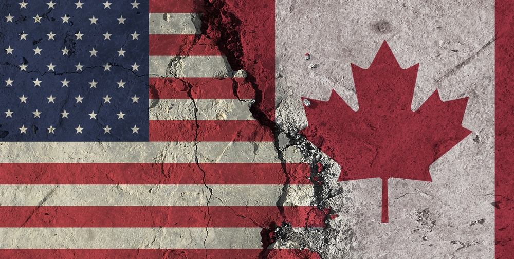 3D illustration concept of trade tariffs between the United States and Canada. A divided U.S. flag and Canadian flag rendering. 