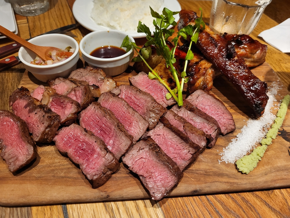Large meat platter feast on a wooden board