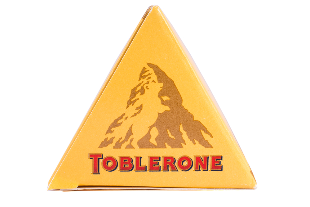 LONDON, UK - DECEMBER 18TH 2017: A close up of the Toblerone logo on the products packaging, on 18th December 2017.  Toblerone is a Swiss chocolate bar brand owned by Mondelez International Inc.