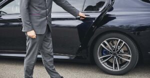 How Alice Walton Surpassed Rivals to Claim the Title of World’s Richest Woman Chauffeur opening car door